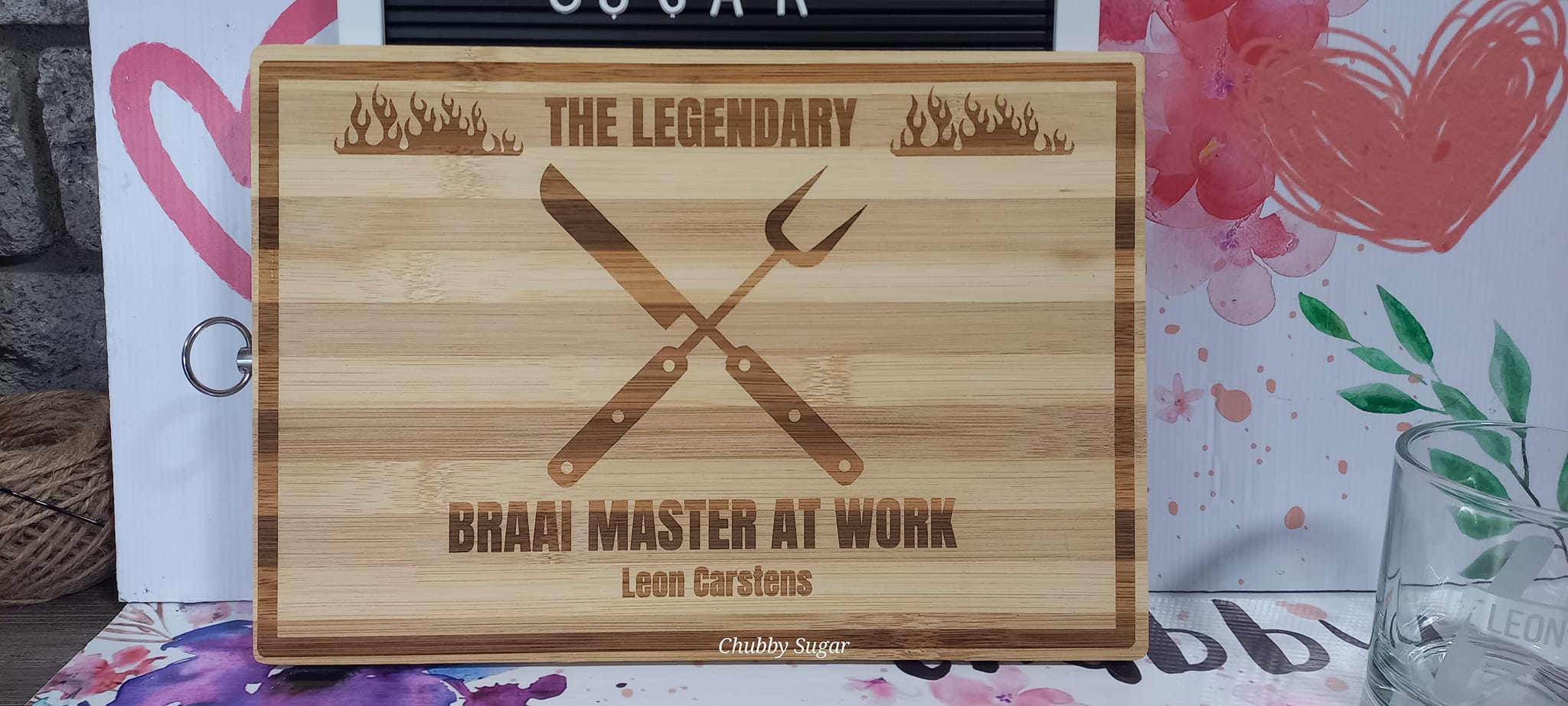 a cutting board with a engrave design on it,done with laser cutting